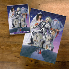 Load image into Gallery viewer, Beetlejuice "Vuzzle" 300 Piece Jigsaw Puzzle in VHS Case, by AQUARIUS