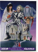 Load image into Gallery viewer, Beetlejuice &quot;Vuzzle&quot; 300 Piece Jigsaw Puzzle in VHS Case, by AQUARIUS
