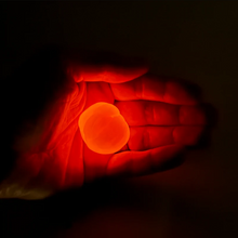 Load image into Gallery viewer, Gootonium: Glowing Orange Solar Putty - 20g
