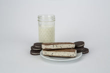 Load image into Gallery viewer, Astronaut Cookies &amp; Cream Ice Cream Sandwich
